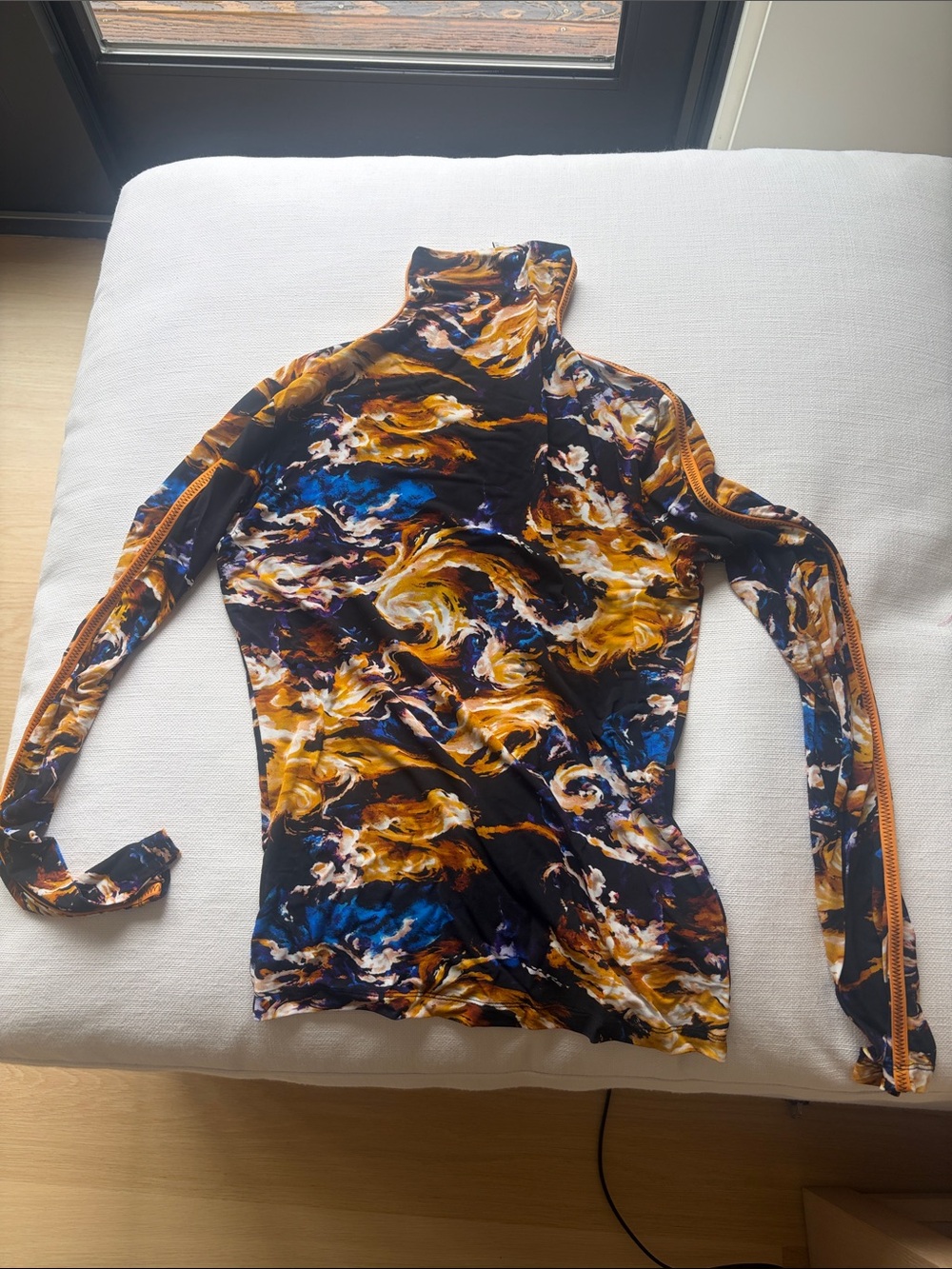 Kenzo Black Mock Neck Long Sleeve Top with Gold and Blue Swirl Print